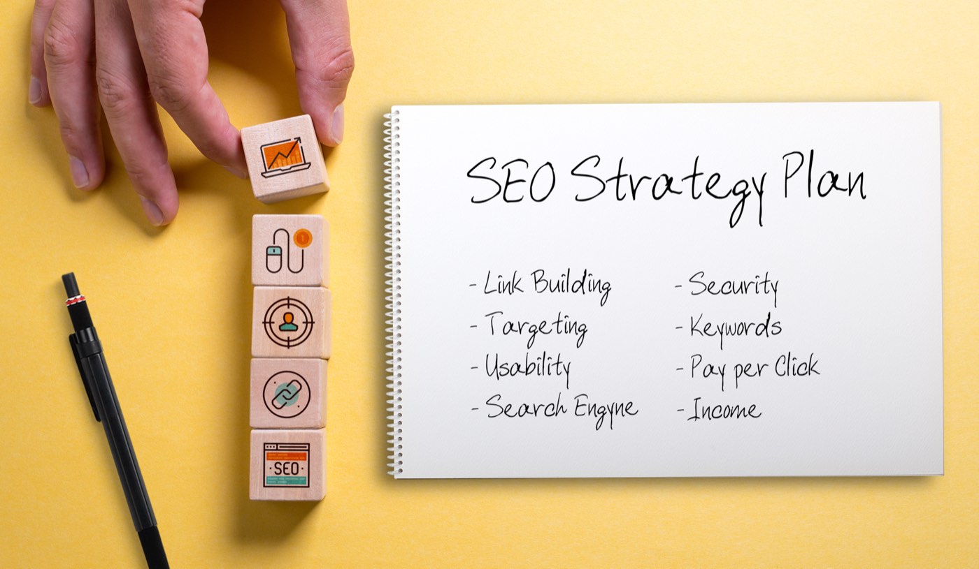 Glowing lightbulb surrounded by SEO topic tags — SEO tips series