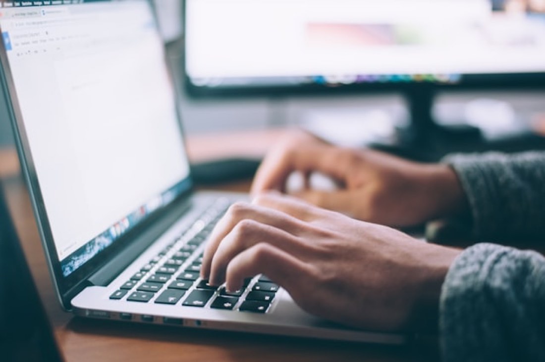 Chatbot conversation on laptop